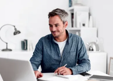 Man sitting at computer desk