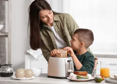 Parent and child with breakfast food